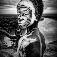 4-piece-aluminium-print-a-boy-of-the-karo-tribe-omo-valley